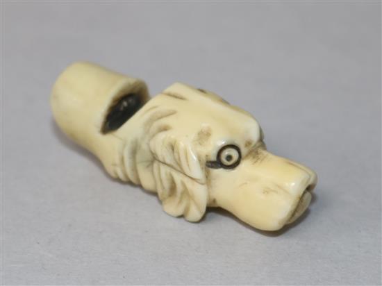 A Victorian ivory dogs head whistle, 4.5cm